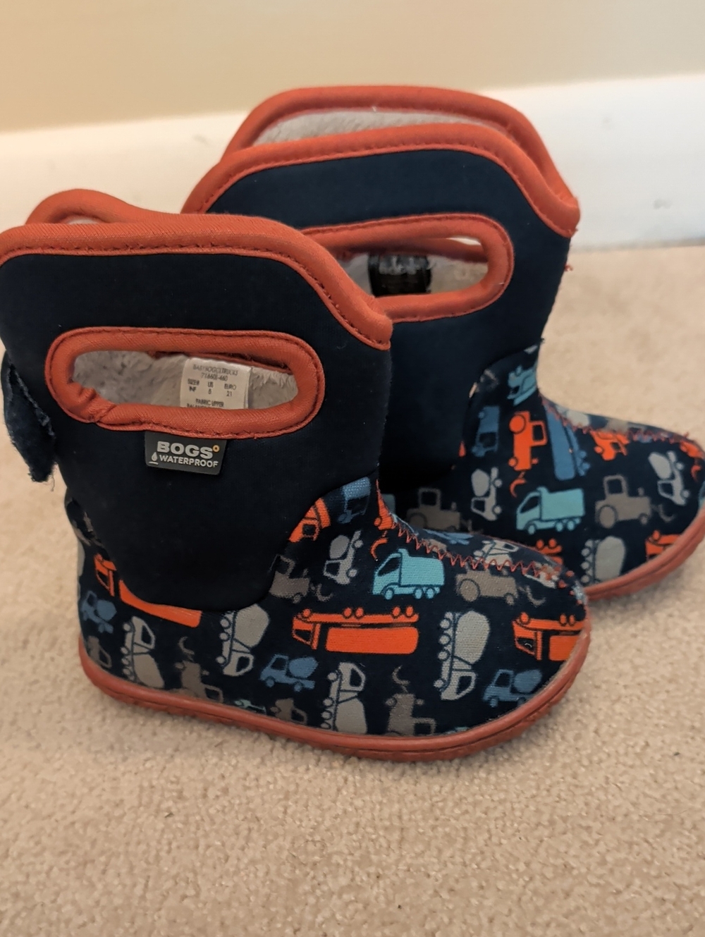 Bogs Kids Navy Boots with Orange Trim and Multicolor Truck Print